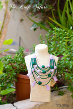 Load image into Gallery viewer, Green and lilac fabric tiered bead and tassel neckpiece
