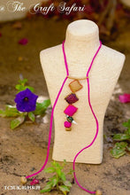 Load image into Gallery viewer, Handcrafted fabric neck-piece with a bird charm
